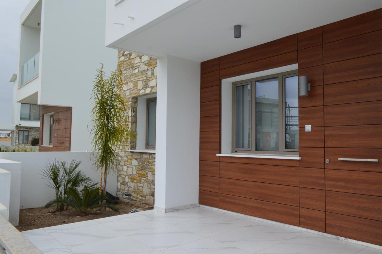 Palm Tree Villas Livadhia ภายนอก รูปภาพ
