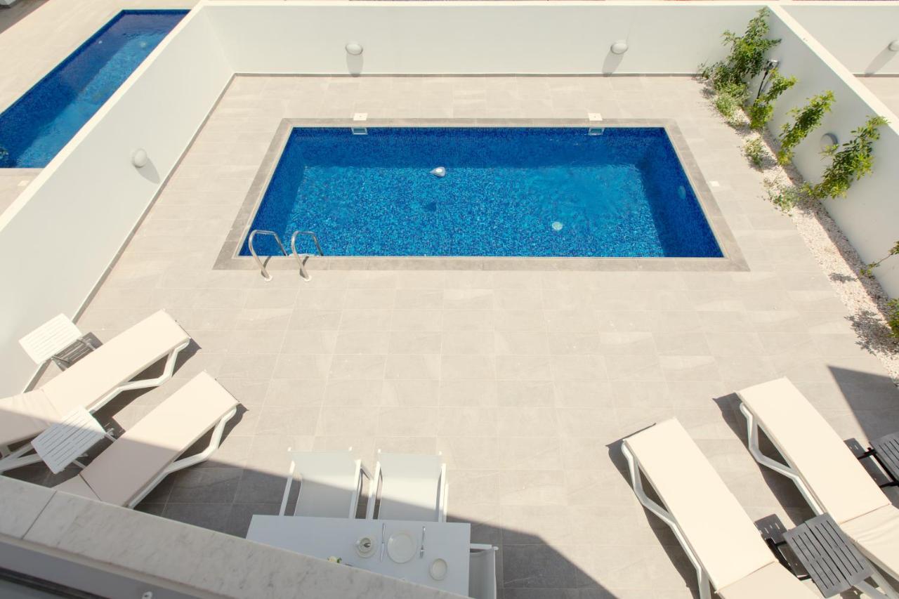 Palm Tree Villas Livadhia ภายนอก รูปภาพ