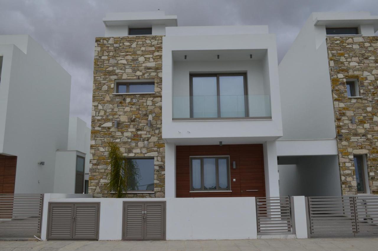 Palm Tree Villas Livadhia ภายนอก รูปภาพ