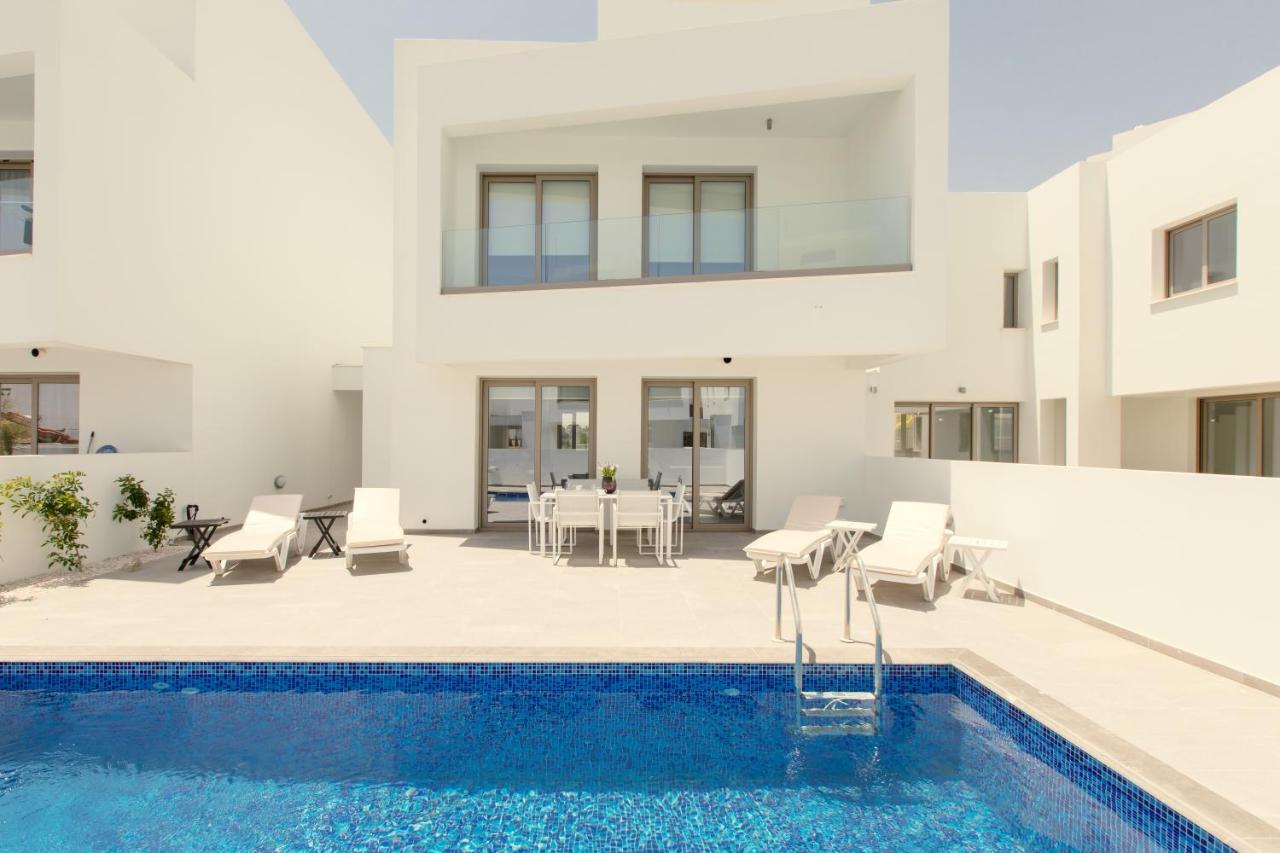Palm Tree Villas Livadhia ภายนอก รูปภาพ